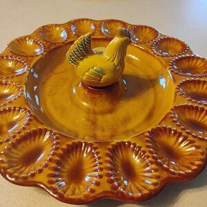 California Pottery E400 deviled egg plate topped with chicken figure